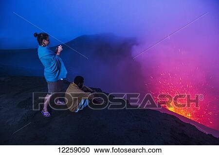 Stock Image - Early morning on the rim of Yasur Volcano; Tanna Island, Vanuatu. Fotosearch