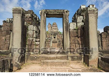 East Mebon Temple dedicated to Hindu god Shiva, built by the king Rajendravarman VII in tenth century, from Angkor; Siem Reap, Cambodia View Large Photo Image Picture - East Mebon Temple dedicated to Hindu god Shiva, built by the king Rajendravarman VII in tenth century, from Angkor; Siem Reap, Cambodia. Fotosearch