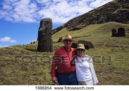 Picture - Easter Island, Rano Raraku Moai Statues, Portrait Of Senior Couple On Hillside.. Fotosearch