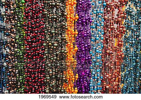 Stock Photo - Ecuador, Otavalo, Necklaces For Sale In A Large Indian Market In The Town Of Otavalo.. Fotosearch