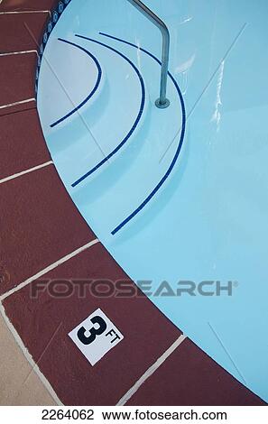 Stock Image - Edge Of A Pool With A 3-Foot Depth Sign; California Usa. Fotosearch