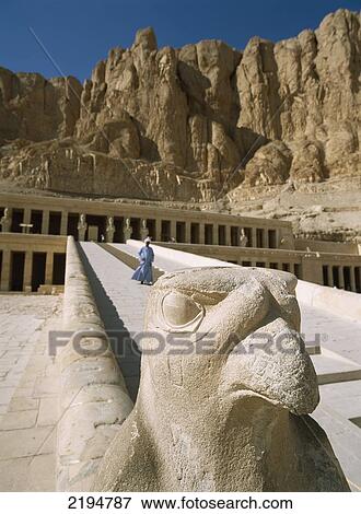 Stock Photo - Egypt, Deir el-Bahri or Hatsheput's Temple; Luxor, Temple guard in front of falcon statue. Fotosearch
