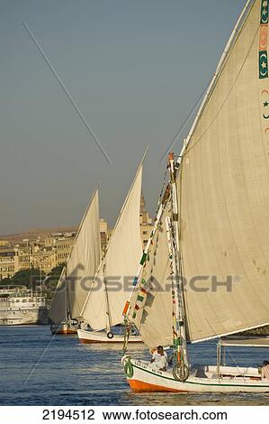 Egypt, Feluccas and other boats on River Nile; Aswan View Large Photo Image Stock Image - Egypt, Feluccas and other boats on River Nile; Aswan. Fotosearch