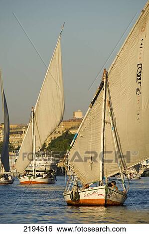 Egypt, Feluccas and other boats on River Nile; Aswan View Large Photo Image Stock Photograph - Egypt, Feluccas and other boats on River Nile; Aswan. Fotosearch