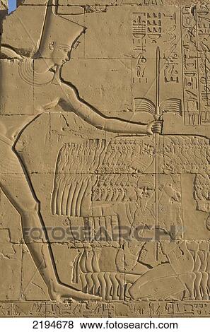 Stock Photo - Egypt, Karnak Temple; Luxor, Reliefs on walls of Precinct of Amun. Fotosearch