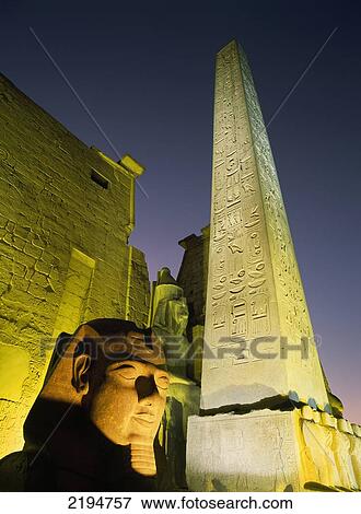 Egypt, Obelisk and pharaoh head at entrance to Luxor Temple at dusk; Luxor View Large Photo Image Stock Photo - Egypt, Obelisk and pharaoh head at entrance to Luxor Temple at dusk; Luxor. Fotosearch