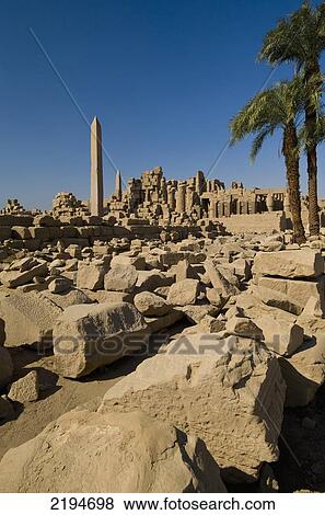 Stock Photo - Egypt, Precinct of Amun; Luxor, Looking across large area of assorted stones from ruins of Karnak Temple. Fotosearch