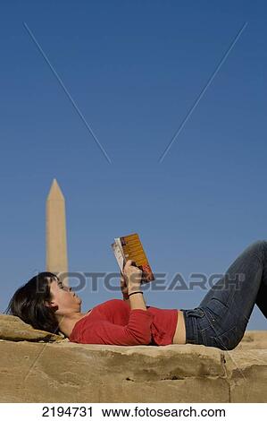 Egypt, with Hatshepsut's obelisk behind; Luxor, Precinct of Amun, Woman reading guidebook to Egypt on old wall of Karnak Temple View Large Photo Image Stock Image - Egypt, with Hatshepsut's obelisk behind; Luxor, Precinct of Amun, Woman reading guidebook to Egypt on old wall of Karnak Temple. Fotosearch