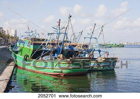 Egyptian Fishing Boats On The Rosetta Branch Of The Nile River, Rosetta (Rashid), Beheira, Egypt View Large Photo Image Stock Image - Egyptian Fishing Boats On The Rosetta Branch Of The Nile River, Rosetta (Rashid), Beheira, Egypt. Fotosearch