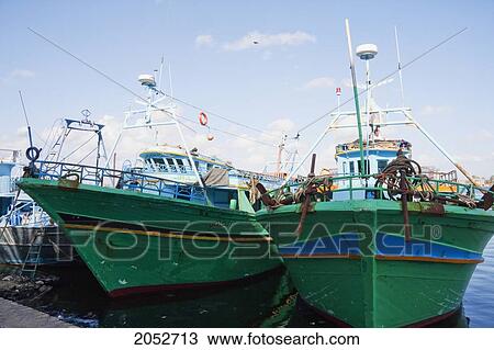 Stock Image - Egyptian Fishing Boats On The Rosetta Branch Of The Nile River, Rosetta (Rashid), Beheira, Egypt. Fotosearch