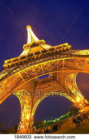 Stock Image - Eiffel Tower At Night; Paris, France. Fotosearch