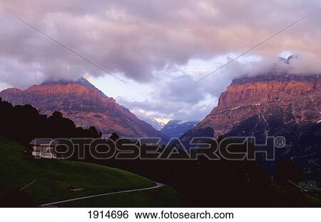 Stock Photograph - Eiger And Jungfrau In Clouds. Fotosearch