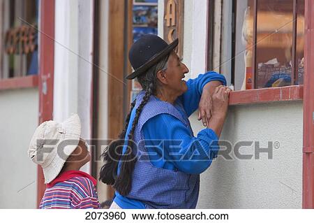 Stock Image - Elderly Aymara Woman By A Store, Coroico, La Paz Department, Bolivia. Fotosearch