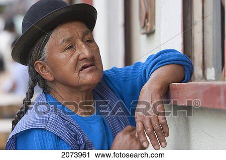 Stock Image - Elderly Aymara Woman By A Store, Coroico, La Paz Department, Bolivia. Fotosearch