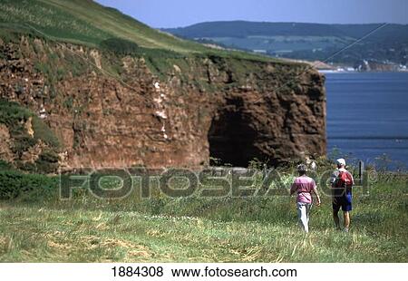 Elderly Couple Walking Along Coastal Path View Large Photo Image Stock Photo - Elderly Couple Walking Along Coastal Path. Fotosearch