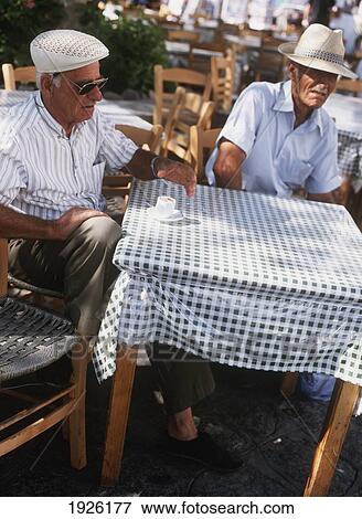 Stock Photo - Elderly Greek Men At Cafe. Fotosearch