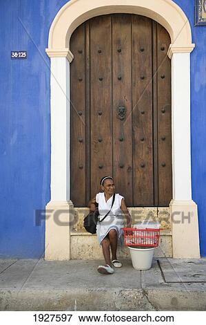 Elderly Lady Selling Snacks By Door View Large Photo Image Stock Photo - Elderly Lady Selling Snacks By Door. Fotosearch