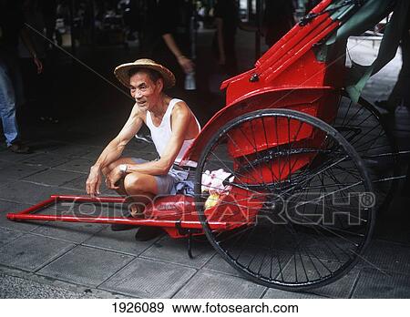 Stock Photo - Elderly Man With His Cart. Fotosearch