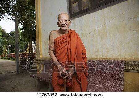 Elderly monk at a monastery; Battambang, Cambodia View Large Photo Image Stock Image - Elderly monk at a monastery; Battambang, Cambodia. Fotosearch