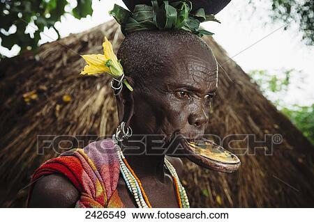 Elderly Surma woman with traditional lip plate, Omo region, Southwest Ethiopia; Kibish, Ethiopia View Large Photo Image Stock Photo - Elderly Surma woman with traditional lip plate, Omo region, Southwest Ethiopia; Kibish, Ethiopia. Fotosearch