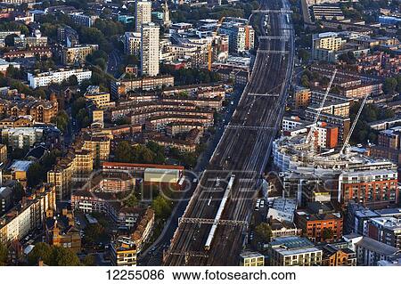 Elevated afternoon view of train lines into London Bridge station from the Shard building; London, England View Large Photo Image Stock Photograph - Elevated afternoon view of train lines into London Bridge station from the Shard building; London, England. Fotosearch