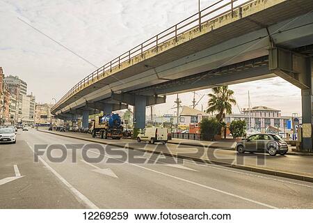 Stock Photo - Elevated road and traffic; Genoa, Liguria, Italy. Fotosearch