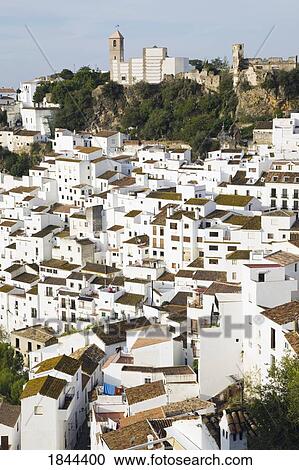 Elevated View Of Village Situated On Hill; Casares, Malaga Province, Spain View Large Photo Image Stock Image - Elevated View Of Village Situated On Hill; Casares, Malaga Province, Spain. Fotosearch