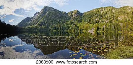 Stock Image - Elsay Lake in morning light of Mount Seymour Provincial Park; North Vancouver, British Columbia, Canada. Fotosearch