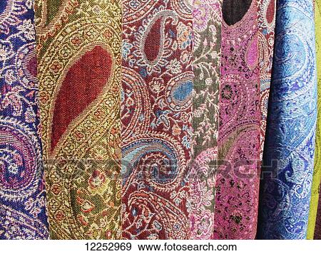 Stock Photo - Embroidered textiles in a souvenir shop, Ichan Kala Old City; Khiva, Uzbekistan. Fotosearch