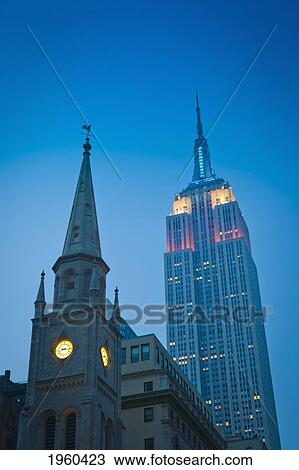 Empire State Building And Collegiate Reformed Church On Fifth Avenue; New York City, New York, United States Of America View Large Photo Image Stock Image - Empire State Building And Collegiate Reformed Church On Fifth Avenue; New York City, New York, United States Of America. Fotosearch