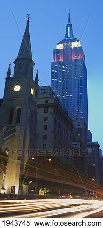 Stock Photography - Empire State Building And Collegiate Reformed Church On Fifth Avenue; New York City New York United States Of America. Fotosearch