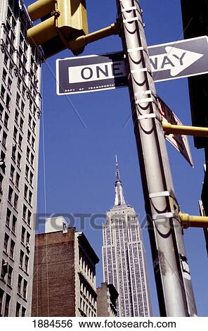 Empire State Building And One Way Sign On Traffic Light View Large Photo Image Stock Photograph - Empire State Building And One Way Sign On Traffic Light. Fotosearch