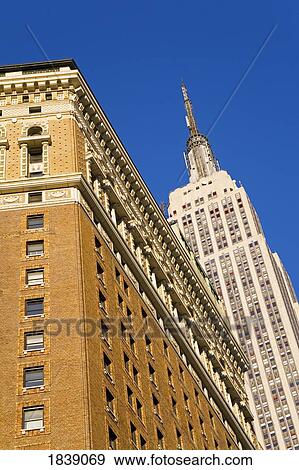 Empire State Building, Low Angle View; New York City, New York State, Usa View Large Photo Image Stock Photo - Empire State Building, Low Angle View; New York City, New York State, Usa. Fotosearch