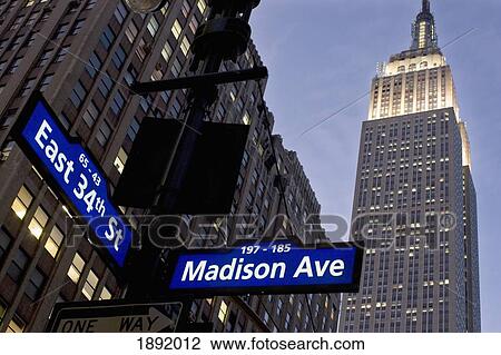 Stock Image - Empire State Building Seen From Madison Avenue At Night. Fotosearch