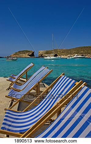 Empty Deckchairs At Blue Lagoon View Large Photo Image Stock Image - Empty Deckchairs At Blue Lagoon. Fotosearch