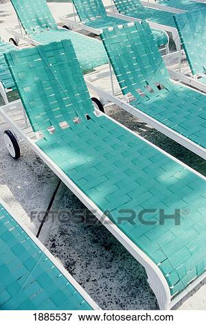 Empty Green Sun Loungers, Close Up View Large Photo Image Stock Photo - Empty Green Sun Loungers, Close Up. Fotosearch