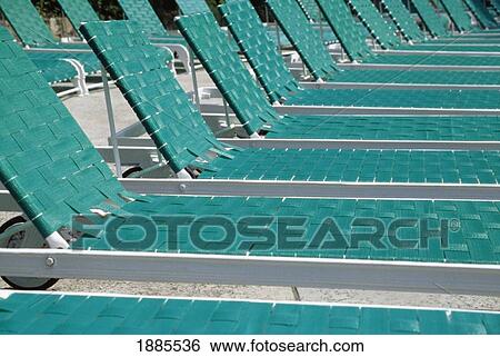 Empty Green Sun Loungers Lined Up In A Row View Large Photo Image Stock Photograph - Empty Green Sun Loungers Lined Up In A Row. Fotosearch