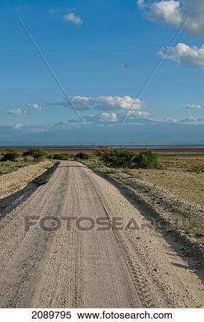 Stock Photography - Empty Road In Kilimanjaro At Amboseli, Kenya. Fotosearch