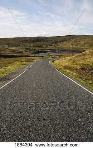 Empty Single Lane Road Through Hills View Large Photo Image Picture - Empty Single Lane Road Through Hills. Fotosearch