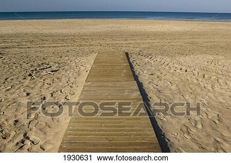 Empty Wooden Walkway On Beach; Zahara De Los Atunes, Costa De La Luz, Spain View Large Photo Image Stock Image - Empty Wooden Walkway On Beach; Zahara De Los Atunes, Costa De La Luz, Spain. Fotosearch