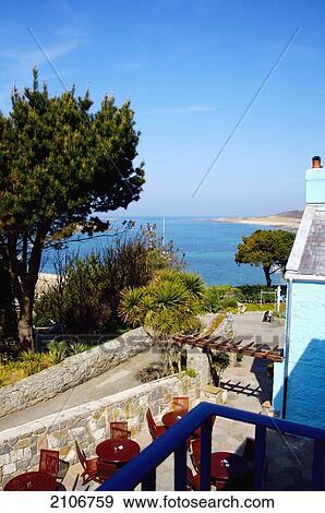 Stock Photo - England, Channel Islands, View of bay from White House Hotel; Herm. Fotosearch