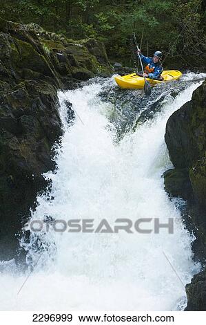 England, Cumbria, Lake District National Park, Canoeist going down Skelwith Force waterfall; Langdale View Large Photo Image Stock Photo - England, Cumbria, Lake District National Park, Canoeist going down Skelwith Force waterfall; Langdale. Fotosearch