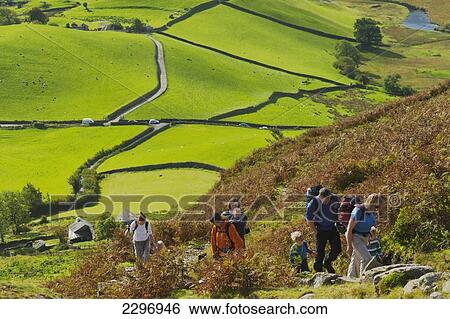 England, Cumbria, Lake District National Park, Parents leading children up path; Little Langdale View Large Photo Image Stock Photograph - England, Cumbria, Lake District National Park, Parents leading children up path; Little Langdale. Fotosearch
