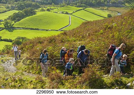 England, Cumbria, Parents leading children up path near Little Langdale; Lake District National Park View Large Photo Image Stock Image - England, Cumbria, Parents leading children up path near Little Langdale; Lake District National Park. Fotosearch