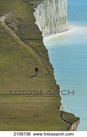 Stock Photograph - England, East Sussex, Landscape with beach and cliffs; Seven Sisters National Park. Fotosearch