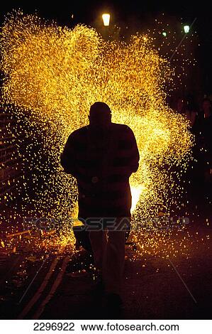 England, East Sussex, Man dragging barrel with shower of embers on Bonfire night; Lewes View Large Photo Image Stock Image - England, East Sussex, Man dragging barrel with shower of embers on Bonfire night; Lewes. Fotosearch