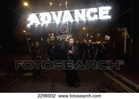 England, East Sussex, Man dressed as monk carrying 'Advance' banner on Bonfire night; Lewes View Large Photo Image Stock Image - England, East Sussex, Man dressed as monk carrying 'Advance' banner on Bonfire night; Lewes. Fotosearch