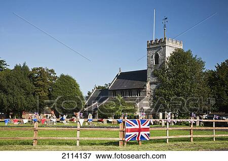 English Village Church And Flag On A Fence; Claverdon Warwickshire England View Large Photo Image Stock Photo - English Village Church And Flag On A Fence; Claverdon Warwickshire England. Fotosearch
