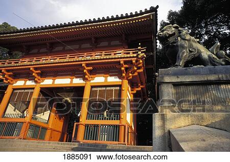 Stock Image - Entrance And Statue At Yasaka Shrine. Fotosearch