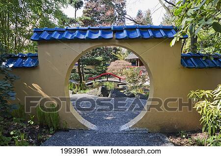 Stock Image - Entrance Gate To The Oriental Garden Of Park & Tilford Gardens, North Vancouver, British Columbia, Canada. Fotosearch